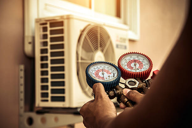Professional Heat Pump Repair technician working in Brookhaven, GA
